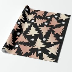 a black and pink christmas tree wrapping paper on a white background with the words, elegant copper foil christmas by elgazzie