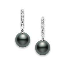 These Mikimoto dangle earrings are crafted in 18K white gold. They feature two 10 millimeter black south sea pearls accented by 0.08 carats of round diamonds. Mikimoto Pearl Earrings, Mikimoto Earrings, Mikimoto Jewelry, White Gold Drop Earrings, Black Pearl Earrings, Tiaras Jewellery, White Gold Diamond Earrings, Pearl And Diamond Earrings, Sea Pearl