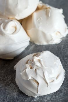 some white icing sitting on top of a table