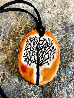 This is a unique hand-formed and hand painted ceramic tree necklace made by Surly Amy at Surly-Ramics. This necklace has one of our small size pendants.This necklace is created using my original drawing of a tree. *PLEASE NOTE I make these in small batches so the necklace you receive may vary slightly from the one in the photo. The color, size and style will be the same but the glaze and spotting effect will settle slightly differently from piece to piece.I have posted a few photos of one of my Artisan Hand Painted White Necklace, Artisan Hand Painted White Necklaces, Artisan White Hand Painted Necklaces, Drawing Of A Tree, Ceramic Tree, Ceramic Necklace, Van Nuys, Tree Necklace, Ceramic Pendant