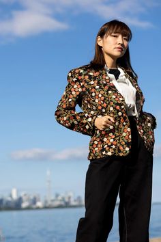 Oh hey there, beautiful floral blazer. Want to hear something weird? Whenever I wear you, people take me more seriously -- in a good way. I'm not sure if it's your custom embroidery. Or your tasteful tailoring. Or just the perfect "blazerness" of you. But thank you, my elegant woolen friend. And thanks for looking equally incredible with jeans, skirts, or pleated pants. You're the best of blazers, you really are. I think I'm going to put you on now and wander to the bookshop with a soulful look Formal Fall Floral Print Blazer, Formal Embroidered Fall Blazer, Embroidered Notch Lapel Blazer For Work, Spring Embroidered Notch Lapel Blazer, Tailored Embroidered Outerwear For Spring, Tailored Embroidered Blazer With Notch Lapel, Formal Fall Embroidered Blazer, Tailored Embroidered Outerwear For Fall, Workwear Embroidered Blazer With Notch Lapel