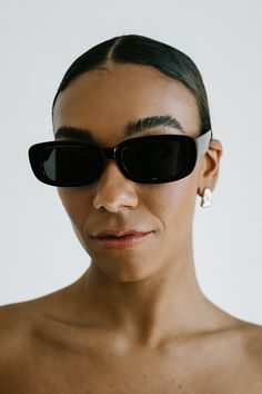 STYLE + FIT NOTES: Introducing our Square Away Sunglasses in Black - the perfect pair for everyday wear. With a sleek frame, these sunglasses are a must-have for any fashion-forward individual. Minimalist Summer Sunglasses With Tinted Lenses, Minimalist Tinted Sunglasses For Summer, Sleek Polarized Sunglasses For Summer, Sleek Polarized Shield Sunglasses For Summer, Minimalist Wayfarer Sunglasses With Tinted Lenses, Chic Matte Black Sunglasses With Tinted Lenses, Sleek Sunglasses With Uva Protection, Trendy Polarized Cat Eye Sunglasses For Everyday, Trendy Everyday Shield Sunglasses With Square Frame