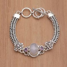 CA $100. | Rainbow moonstone and amethyst pendant bracelet, 'Jepun Glow' - Rainbow Moonstone and Amethyst Pendant Bracelet from Bali Silver Link Bracelet, Amethyst Color, Silver Jewels, Amethyst Bracelet, Amethyst Pendant, Sterling Silver Cuff, Balinese, Pendant Bracelet, Silver Cuff