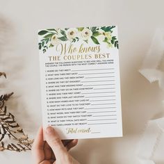 a person holding up a printable wedding game with the words, who knows the couples best?