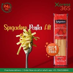 spaghetti pasta on a fork next to the package