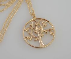 A symbol of growth, strength and positive energy, this beautiful 14K gold Tree of Life Pendant and chain are truly inspiring. A great gift for a friend or your source of inspiration. The necklace will be shipped in a beautiful gift box. ★ Tree of life pendant is 14K yellow gold, it is 22mm. ★ Necklace is 14K yellow gold . Please choose 1.5mm flat cable chain (delicate ) or 1.3mm Double rope chain. Please read our policies before you place your order. https://www.etsy.com/shop/SashJewelry/policy? Mother Daughter Necklaces Set, Gold Tree Of Life, Gift For Grandmother, Gold Heart Bracelet, Heirloom Jewelry, Small Bracelets, Gold Pendant Jewelry, Heirlooms Jewelry, Gold Tree