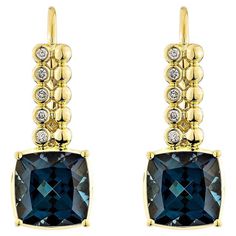 Introducing a new earring pair design that embodies luxury, fashion, and personal style. The collection includes antique earrings set with stunning jewels such as London blue topaz. One establishing piece is a London blue topaz earrings set with stunning diamonds. This earring, made of 18karat yellow gold, has an attractive and timeless style. London Blue Topaz Drop Earring in 18Karat Yellow Gold with White Diamond. London Blue Topaz: 5.70 carat, 8X8mm size, cushion shape. White Diamond: 0.09 ca Luxury Antique Topaz Jewelry, London Blue Topaz Earrings, Blue Topaz Earrings, Topaz Earrings, Naha, Antique Earrings, London Blue Topaz, London Blue, Earrings Set