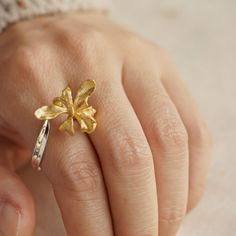 "Iris often appears in the paintings of Monet and Van Gogh. It is a symbol of light and freedom, and a flower full of romantic artistic atmosphere. Not too small or big, our Iris ring design has been handcrafted with feather lightweight in order to pamper your delicate finger. Like the rainbow, this ring will bring out the colorful side of your style while enhancing and accentuating other accessories you pair them with. MEASUREMENTS Flower diameter:approx.2 cm/0.79 inches Original size: US size Hallmarked Flower Shaped Ring As A Gift, Hallmarked Flower Ring As Gift, Artistic Flower Jewelry For Wedding, Hallmarked Flower Shaped Ring For Gift, Artistic Flower Jewelry For Weddings, Van Gogh Jewelry, February Birth Flower, Iris Ring, February Birth Flowers