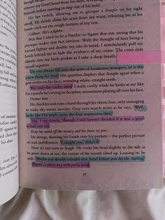 an open book with pink and green text on it