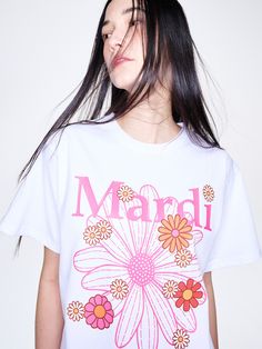 Editor's NotesThis is a T-shirt from 'Mardi Mercredi', featuring the new 23 SS graphic [FLOWERMARDI BLOSSOM]. One big flower with the brand logo and small colorful flowers make the item attractive.- Made with 100% cotton fabric that has a sturdy texture- Oversized fit for comfortable wear experience- Appropriate length allowing for various stylingsMeasurements(in.)One Size(XS-M)- Length: 25.59 in.- Shoulder: 18.11 in.- Chest: 21.26 in.- Sleeve Length: 7.09 in.* Model Info(ZUZANNA, Black Hair): H Round Neckline Dress, Plant Logo, Layered T Shirt, Cotton Linen Dresses, Layering Outfits, Home T Shirts, Chrysanthemum, Sleeve Detail, Patterned Shorts