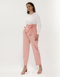 Viscose pants create an elegant feminine silhouette and make legs visually longer because of an extra high rise. Pants have wide belt loops, so You could use our fabric belt that is included or combine pants with all belts You have. Pants are made from very smooth viscose fabrics in soft blue and pink colors.The pants have comfortable side pockets and a hidden zipper on the side. Composition: 60% viscose, 35% polyester, 5% elastaneCare: We recommend a professional dry clean. Do not wash. Do not