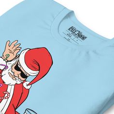 Funny Santa Claus t-shirt with Santa throwing candy canes while holding a glass of eggnog. A funny Santa Bae graphic tee for anybody feeling festive during the holidays and looking for a funny Santa t-shirt for a Christmas party. • 100% combed and ring-spun cotton (Heather colors contain polyester) • Fabric weight: 4.2 oz./yd.² (142 g/m²) • Pre-shrunk fabric • Side-seamed construction • Shoulder-to-shoulder taping • Blank product sourced from Nicaragua, Mexico, Honduras, or the US Holiday Party T-shirt With Crew Neck, Christmas Novelty T-shirt With Graphic Print, Novelty Christmas T-shirt With Graphic Print, Novelty Christmas Graphic Print T-shirt, Christmas Party T-shirt With Graphic Print, Funny Holiday T-shirt With Graphic Print, Funny Crew Neck T-shirt For Gifts, Funny Crew Neck T-shirt For Party, Funny Print T-shirt For Party