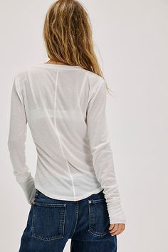 A true layering staple, this easy henley top will be your go-to from this season to the next. **Fit:** Slim, classic henley fit **Features:** Front button neckline, lightweight fabrication, front pocket detail, thumbholes in sleeves, raised seaming for a lived-in look **Why We ❤ It:** Effortless with jeans or cozy with lounge bottoms, this style has endless ways to wear. | Seize The Day Henley by Intimately at Free People in White, Size: L Fitted Henley Neckline Top For Everyday, Henley Neckline Tops For Spring Everyday Wear, Spring Layering Henley, White Henley Top For Fall, White Henley Neckline Top For Fall, Classic Henley Neckline Top For Layering, Seize The Day, Henley Top, Pocket Detail