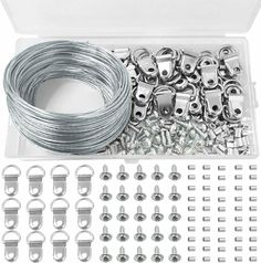 an assortment of metal wire and nuts in a plastic case with screws, hooks, and