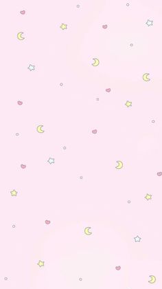 a pink background with stars and moon shapes