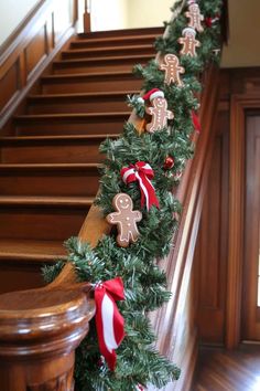 christmas garland with gingerbreads and candy canes on the bannister rail