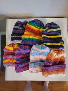 Beanie is made with a cotton/acrylic yarn blend and is knit in the round and double layered for warmth. Please note that because of the handmade nature of this product, color placement may not be exact and item may have some irregularities in the knit pattern.  Comes in the following flag colorways: - Pride -lesbian - bisexual -pansexual -transgender -asexual - non binary Striped Beanie Hat One Size, Striped Beanie Hat, One Size Fits Most, Multicolor Yarn Beanie Cap, Multicolor Yarn Beanie, Multicolor Hand-knitted Beanie Cap, Multicolor Casual Yarn Beanie, Multicolor Knit Cap, Multicolor Soft Knit Beanie One Size, Multicolor Acrylic Yarn Beanie Cap