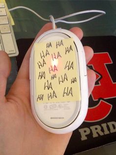 a hand holding a cell phone with writing on it that says, watch a friend struggle with his mouse for 5 minutes before discovering this