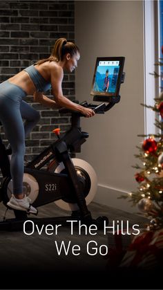 a woman on an exercise bike with the words black friday price guarantee below her image