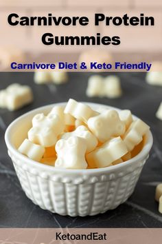 a white bowl filled with carnivore protein gummies on top of a table