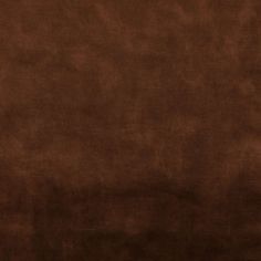 an image of a brown background that looks like suede