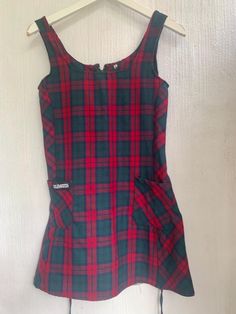 Vintage 90s dress plaid a lined bluebwhite red strap shoulder size 38 Measurements Bust 17inches ( red line lower) Lenght from waist 21inches Condition good vintage dress green red  bust 40cmx 2 lenght 79cm waist 36cmx2 polyester  size 36 XS Plaid A Line Dress, Fitted Plaid School Dress, Fitted Plaid Dress For School, Red Fitted Plaid Casual Dress, Casual Red Fitted Plaid Dress, Casual Fitted Red Plaid Dress, Retro Mini Length Plaid Dress, Casual Plaid Dress For School, Sleeveless Plaid School Dress