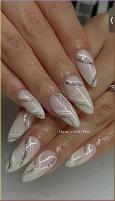 White Milky Wedding Nails Nail Art White And Silver, White Fancy Nails Art Designs, White Artsy Nails, Milky White And Silver Glitter Nails, White And Silver Star Nails, White And Silver Marble Nails, Graduation White Nails, Elegant Almond Nails Classy 2024, Silver Bridal Nails