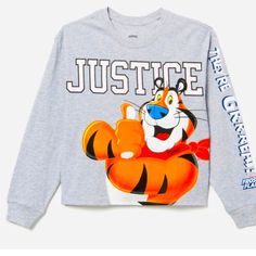 Justice Nwot Size Large 12-14 Oversized Frosted Flakes Tony The Tiger Long Sleeve Tee Bin 2 Cereal Breakfast, Breakfast Birthday, Tony The Tiger, Pink Long Sleeve Shirt, Plus Size Tees, Justice Shirts, Striped Long Sleeve Tee, Tie Dye Hoodie, The Tiger