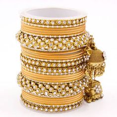 Gold Rodium Polish Yellow color Bangles in Metal Alloy studded with CZ Diamond Fancy Dress Material, Metal Bangles, Ear Cuff Jewelry, Antique Jewellery Online, Kundan Bangles, Indian Fashion Jewellery, Golden Flower, Bridal Bangles, Bangles Jewelry Designs