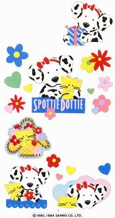 some stickers that are on the side of a white wall with flowers and dogs