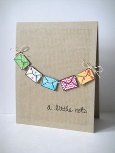 a little note card with some paper hanging from it's side and the words, a little note