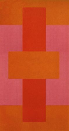 an orange and pink rug with squares on it's sides, in the middle