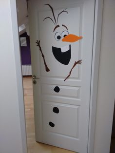 a door decorated to look like a frozen snowman