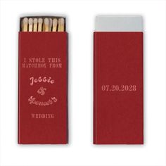 two matches in a red matchbox with the words i stole this matchbox from jesus and edward's wedding