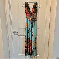 Xxl Nwot Bohemian Summer Maxi Dress Turqouise Color With Floral Accents Soft & Silky Material Hand Wash Cold Or Dry Clean 100% Viscose Nwot This Item Is In Brand New Condition Never Worn. Bust 44.09, Waist 23.6”, Hipline 54.35”, Hem 69.29” Ask Me Any Questions Or If Measurements Needed! Turquoise Maxi Dress For Beach Cover-up In Spring, Turquoise Maxi Dress For Vacation, Turquoise Maxi Dress For Vacation And Spring, Spring Vacation Turquoise Maxi Dress, Turquoise Spring Sundress Maxi Dress, Turquoise Sundress For Spring, Turquoise Floral Print Maxi Dress, Spring Turquoise Maxi Dress For Beach Cover-up, Turquoise Maxi Dress For Spring Beach Cover-up