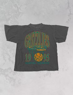 Show the love for your favorite team in this Memphis Basketball oversized tshirt that is inspired by vintage 90s NBA tshirts!- Screen print transfer that is heat pressed onto each tshirt- Tshirt is a super soft vintage wash that gets softer after each wash- Oversized fit- Sizing translation: XS/S = L , S/M = XL , L/XL = 2XL , 2XL/3XL = 3XL , 4XL/5XL = 4XL- Size up if you want a tshirt dress fit- 100% Cotton**due to screens & filters color may vary from pictures** Vintage Oversized Tshirt, Memphis Basketball, 90s Nba, 90s Sports, Screen Print Transfer, Print Transfer, Western Chic, Sporty And Rich, Oversized Tshirt