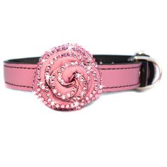 a pink dog collar with a rose on it