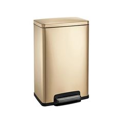 a gold trash can on a white background