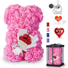 a teddy bear made out of pink roses and other items for valentine's day