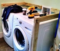 a washer and dryer sitting next to each other