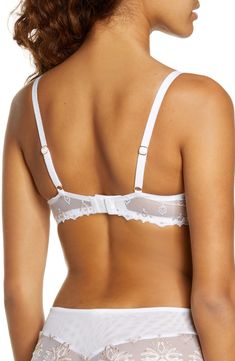 Seamed cups offer comfortable support and shape in this romantic embroidered demi. Lined Polyester/polyamide/spandex Hand wash cold, dry flat Imported Lingerie Feminine Push-up Bra With Removable Cups, White Underwire Nursing Bra With Removable Cups, White Nursing Bra With Removable Cups And Underwire, White Push-up Nursing Bra With Removable Cups, White Underwire Bra With Removable Cups, White Full Cup Bra With Padded Cups, White Low-cut Padded Bra, White Bra With Removable Cups, White Delicate Lace Push-up Bra