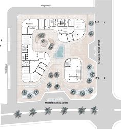 an aerial view of the ground plan for a building with several parking spaces and trees