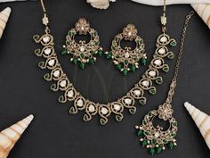 Beautiful Imitation Bottle Green Reverse AD Full Stone Work with Pearl Drops Mehndi Polish Necklace Set Earrings and Mang Tikka Petite Kundan Polki Necklace/Reverse AD Necklace set /Choker Necklace/ Bridesmaid Jewelry Sets/ Women Girl Necklace Traditional Gold Plated Necklace Sets are ideal for Women Girl fit for any attire occasion. Please be advised of slight color variations due to a light effect. Green Jewelry For Eid, Mang Tikka, Necklace Traditional, Girl Necklace, Polki Necklace, Set Earrings, Necklace Sets, Bridesmaid Jewelry Sets, Matching Jewelry