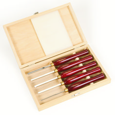 a wooden box filled with red crochet hooks