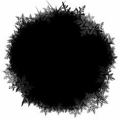 an abstract black and white photo with snow flakes in the shape of a circle