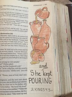 an open bible with the words she kept purring on it and two vases