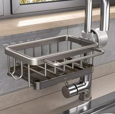 a stainless steel sink and faucet in a kitchen