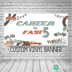 a sign that says,'custom vinyl banner'with cars and race flags on it