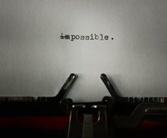 an old typewriter with the word possible written on it