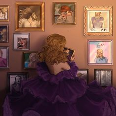 a woman in a purple dress is looking at pictures on the wall